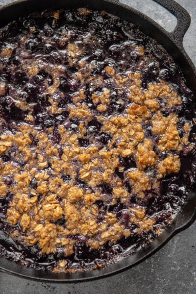 blueberry crumble in a cast iron skillet