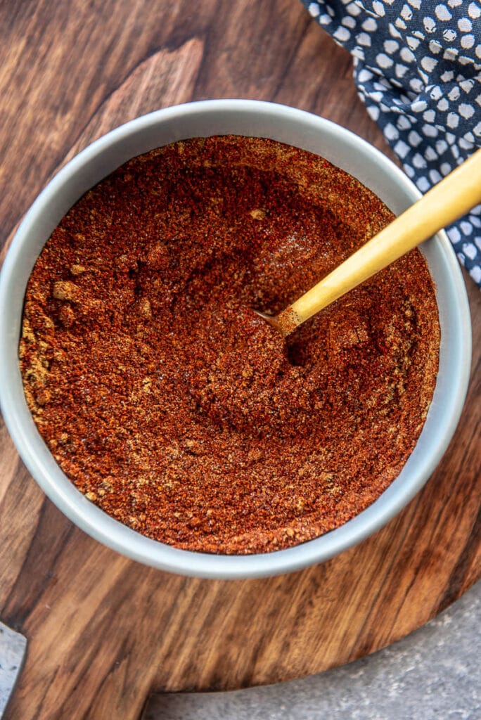 chili seasoning in a bowl with spoon